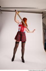 TINA STANDING POSE WITH SWORD